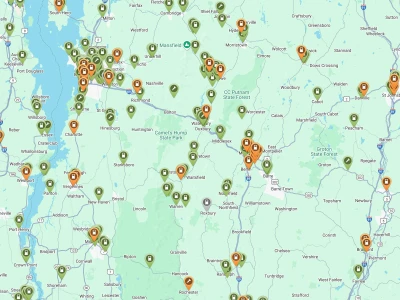 An image of the available public EV charging stations overlaid on a map of Burlington Vermont and the surrounding area.